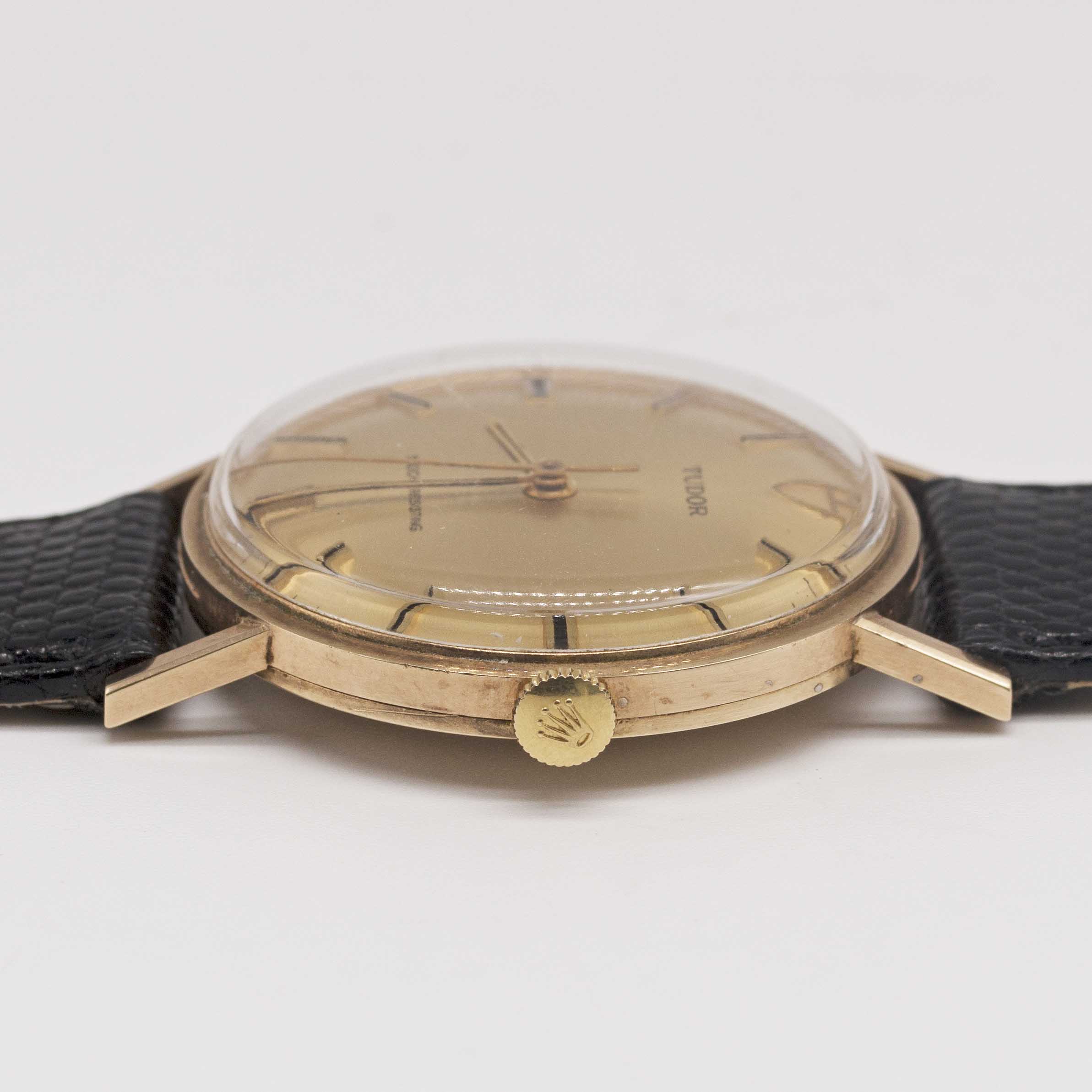 A GENTLEMAN'S 9CT SOLID GOLD ROLEX TUDOR SHOCK RESISTING WRIST WATCH CIRCA 1969, WITH CHAMPAGNE - Image 7 of 10