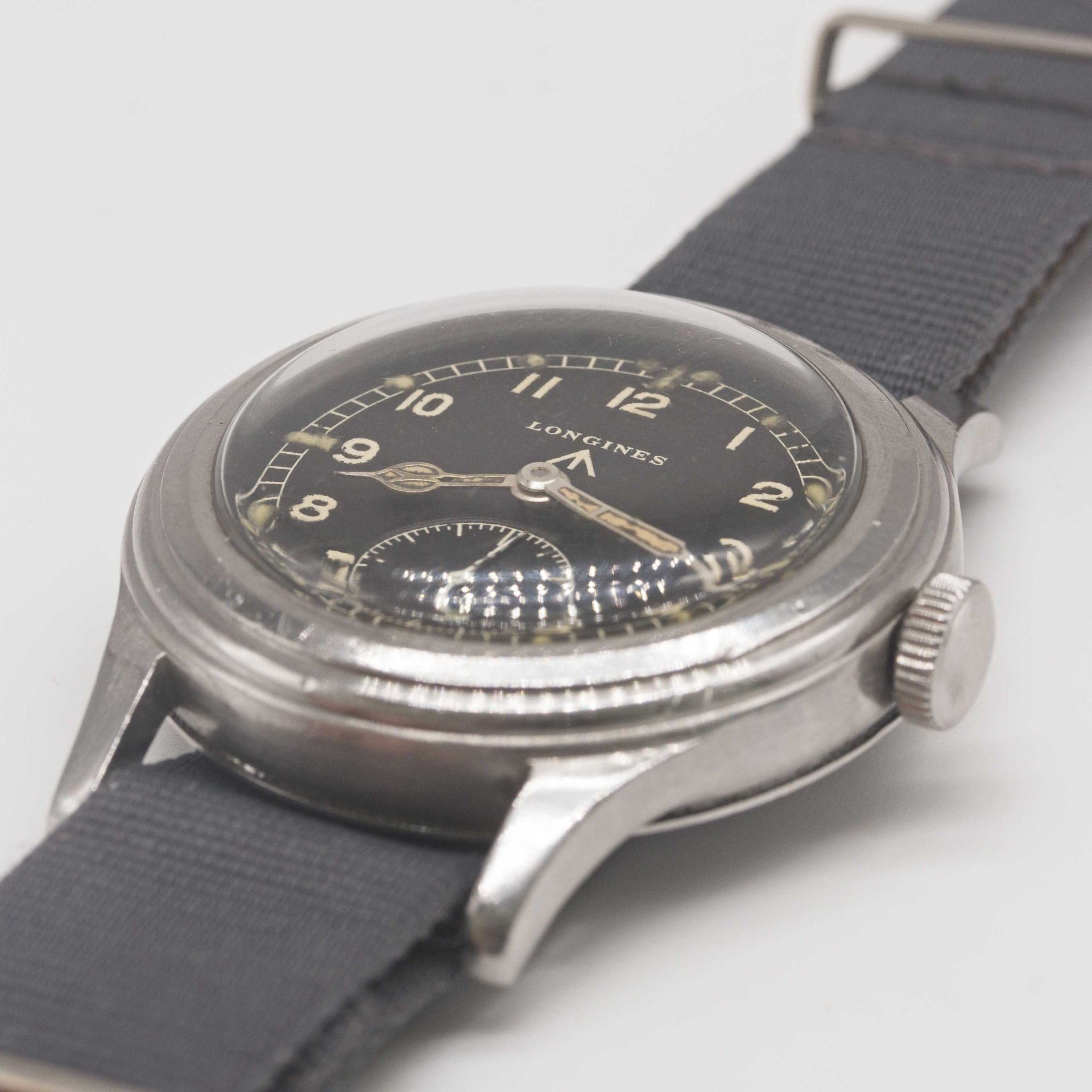 A GENTLEMAN'S STAINLESS STEEL BRITISH MILITARY LONGINES W.W.W. WRIST WATCH CIRCA 1945, PART OF - Image 9 of 9