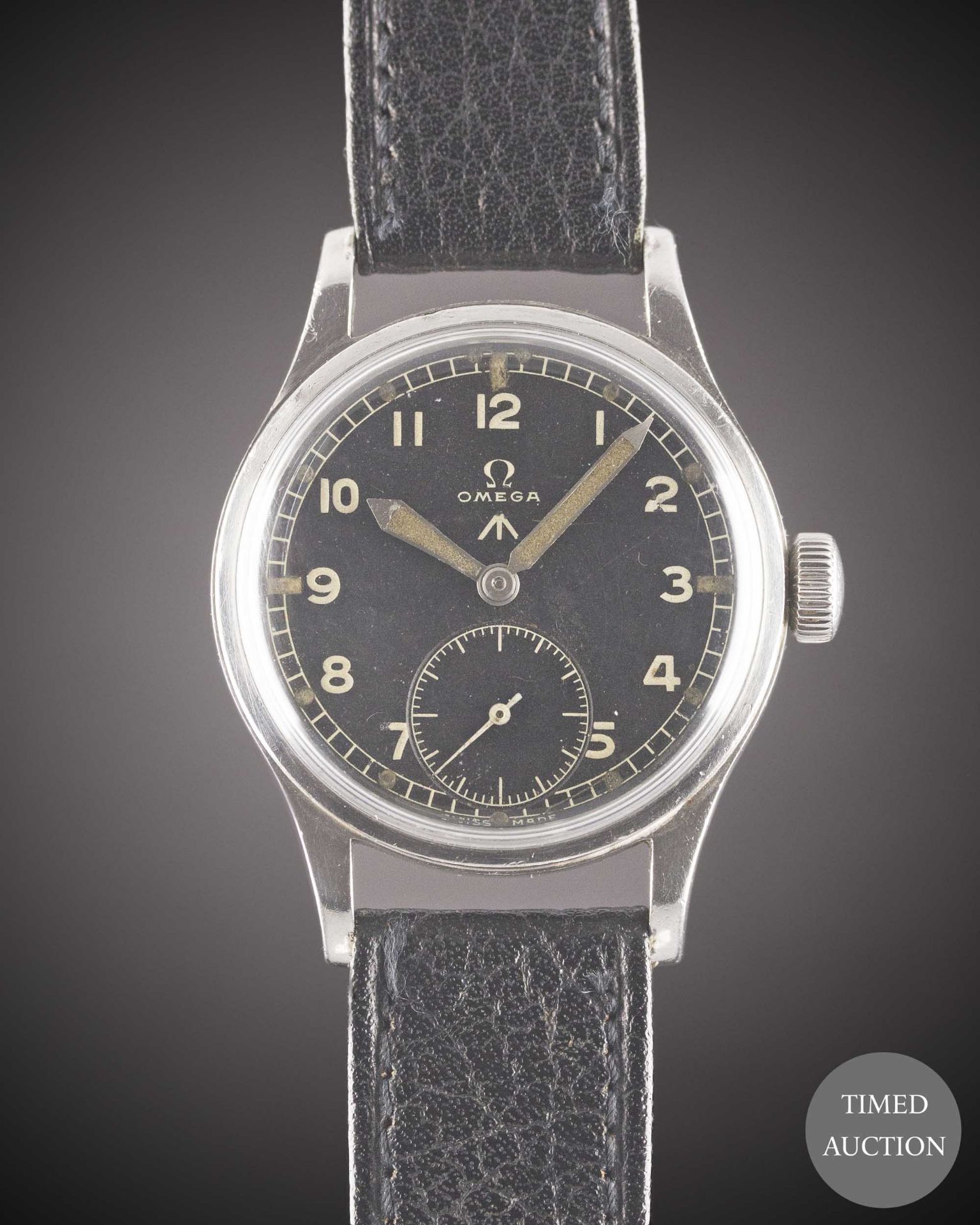 A GENTLEMAN'S STAINLESS STEEL BRITISH MILITARY OMEGA W.W.W. WRIST WATCH CIRCA 1945, PART OF THE "