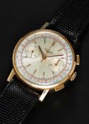 A GENTLEMAN'S 18K SOLID ROSE GOLD LONGINES FLYBACK CHRONOGRAPH WRIST WATCH CIRCA 1960s, REF. 7414