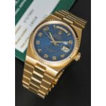 A GENTLEMAN'S 18K SOLID GOLD ROLEX OYSTERQUARTZ DAY DATE BRACELET WATCH CIRCA 1987, REF. 19018N WITH