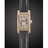 A LADIES 18K SOLID YELLOW GOLD CARTIER TANK AMERICAINE WRIST WATCH DATED 2005, REF. 2482 WITH