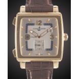 A GENTLEMAN'S 18K SOLID YELLOW GOLD ULYSSE NARDIN QUADRATO DUAL TIME WRIST WATCH CIRCA 2010, REF.