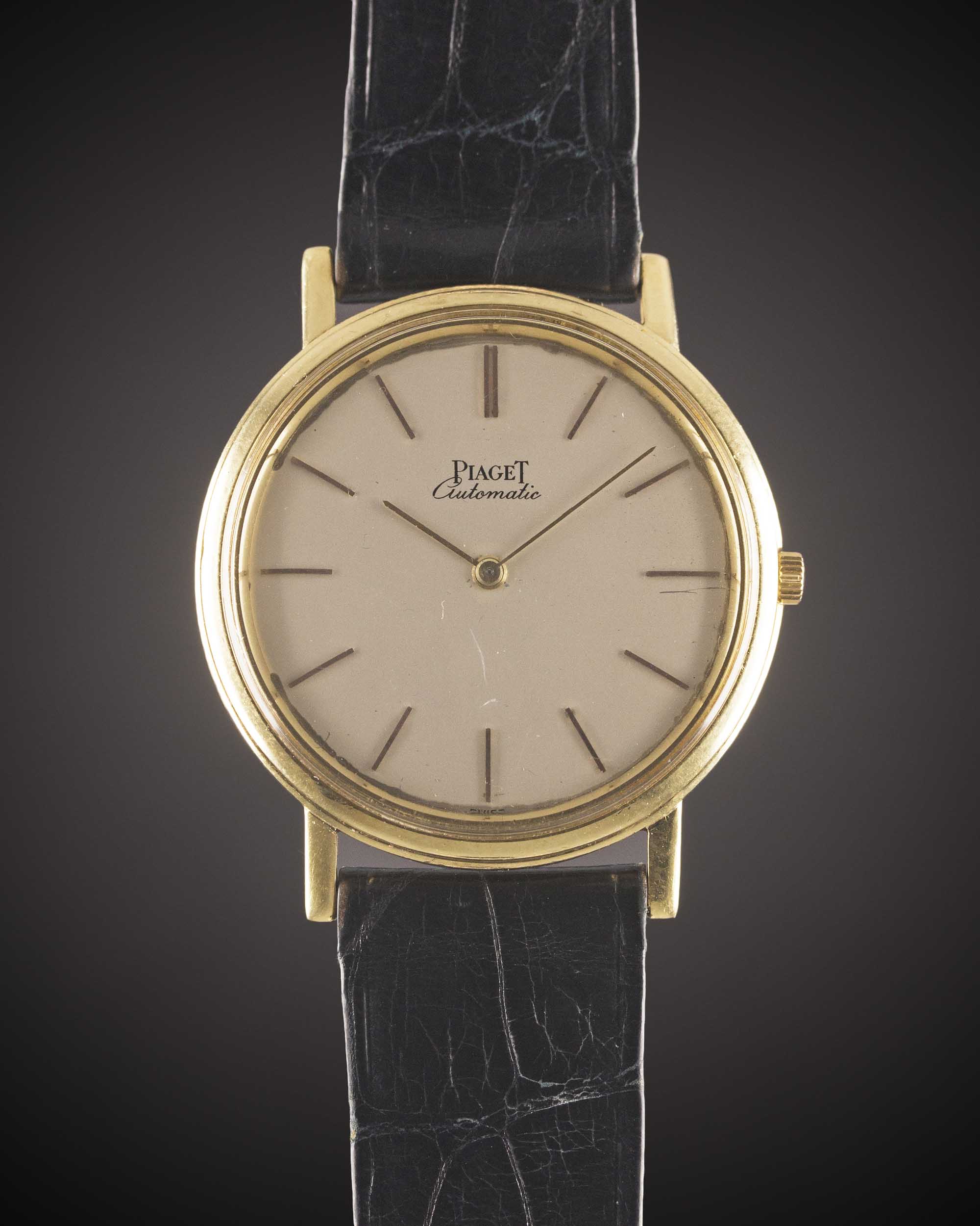 A GENTLEMAN'S 18K SOLID YELLOW GOLD PIAGET "ULTRA THIN" AUTOMATIC WRIST WATCH CIRCA 1970s, REF.