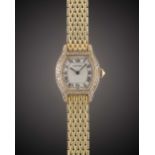 A LADIES 18K SOLID YELLOW GOLD & DIAMOND CARTIER TORTUE BRACELET WATCH CIRCA 1990s Movement: Quartz,