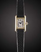 A LADIES 18K SOLID GOLD CARTIER PARIS "MINI" TANK WRIST WATCH CIRCA 1970s, WITH MANUAL WIND CAL. 845