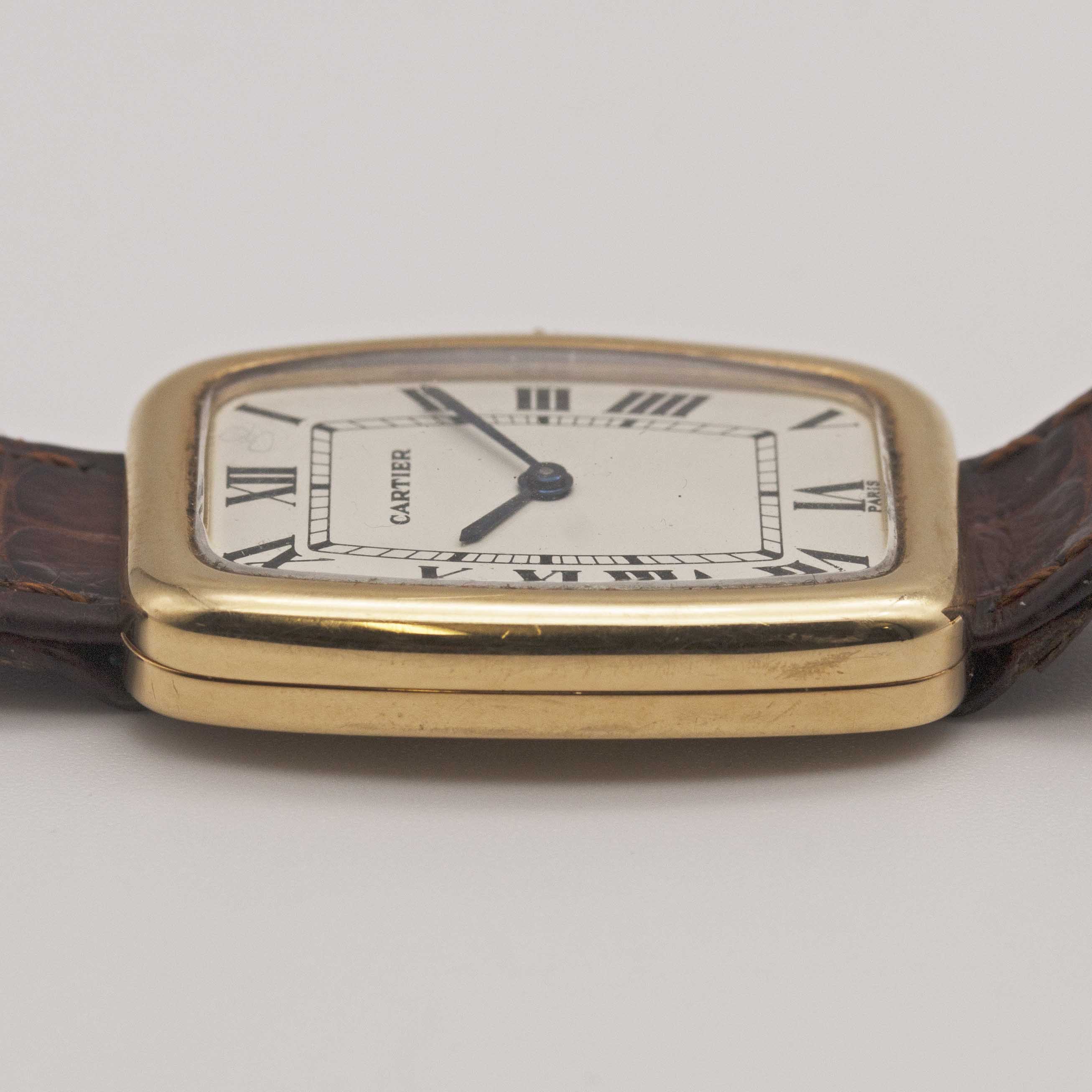 A GENTLEMAN'S SIZE 18K SOLID GOLD CARTIER FABERGE TONNEAU WRIST WATCH CIRCA 1980s Movement: 17J, - Image 11 of 12