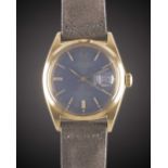 A GENTLEMAN'S 18K SOLID YELLOW GOLD ROLEX OYSTER PERPETUAL DATEJUST WRIST WATCH CIRCA 1969, REF.