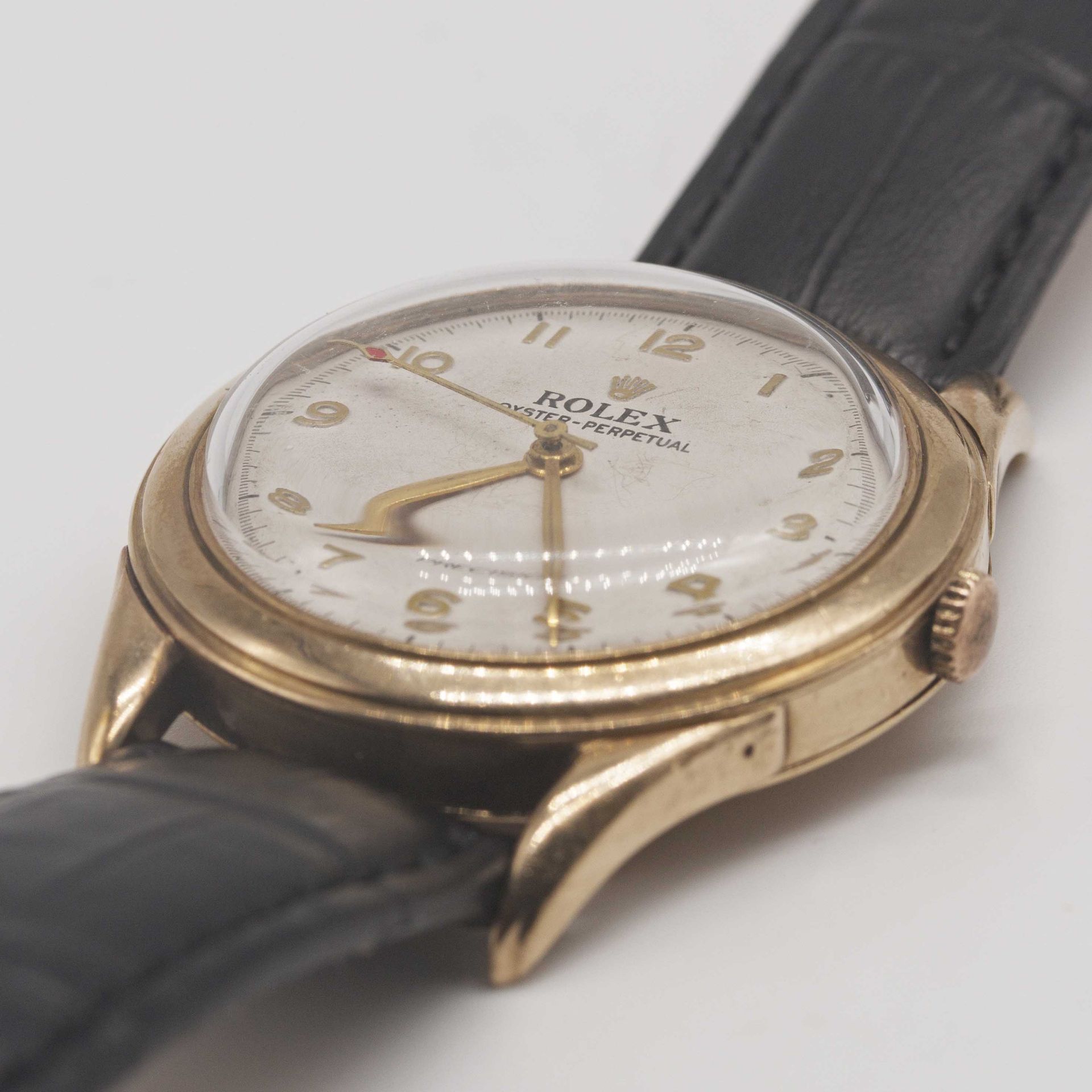 A GENTLEMAN'S 9CT SOLID GOLD ROLEX OYSTER PERPETUAL WRIST WATCH CIRCA 1950s Movement: Automatic " - Image 3 of 10