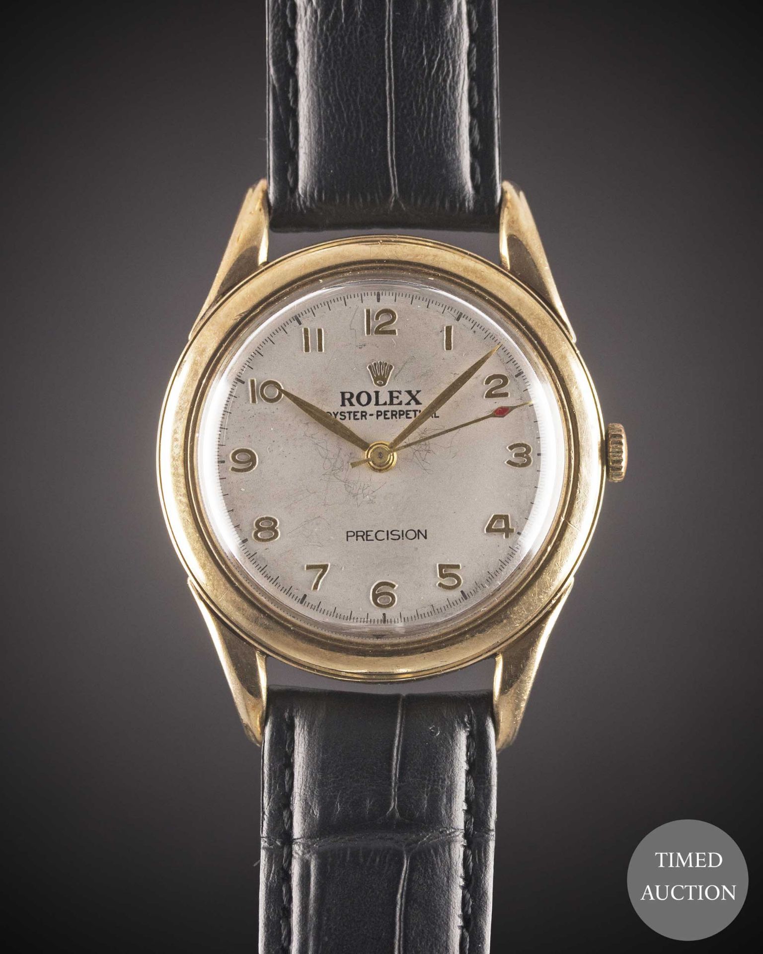 A GENTLEMAN'S 9CT SOLID GOLD ROLEX OYSTER PERPETUAL WRIST WATCH CIRCA 1950s Movement: Automatic "