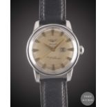 A GENTLEMAN'S STAINLESS STEEL LONGINES CONQUEST CALENDAR AUTOMATIC WRIST WATCH CIRCA 1957, REF. 9004