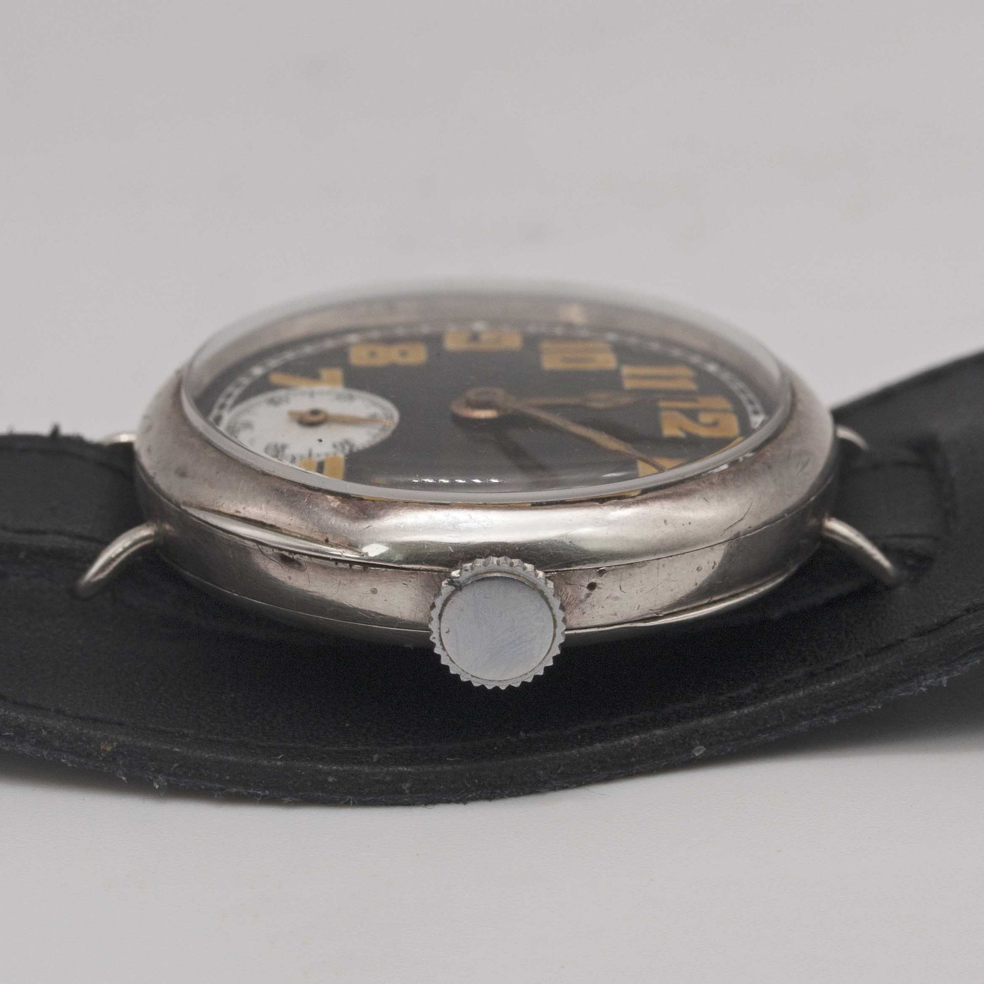 A GENTLEMAN'S SOLID SILVER ROLEX OFFICERS WRIST WATCH CIRCA 1918, WITH BLACK ENAMEL DIAL & CATHEDRAL - Image 9 of 10