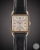 A GENTLEMAN'S 18K SOLID ROSE GOLD PATEK PHILIPPE WRIST WATCH CIRCA 1940s, WITH REFINISHED DIAL