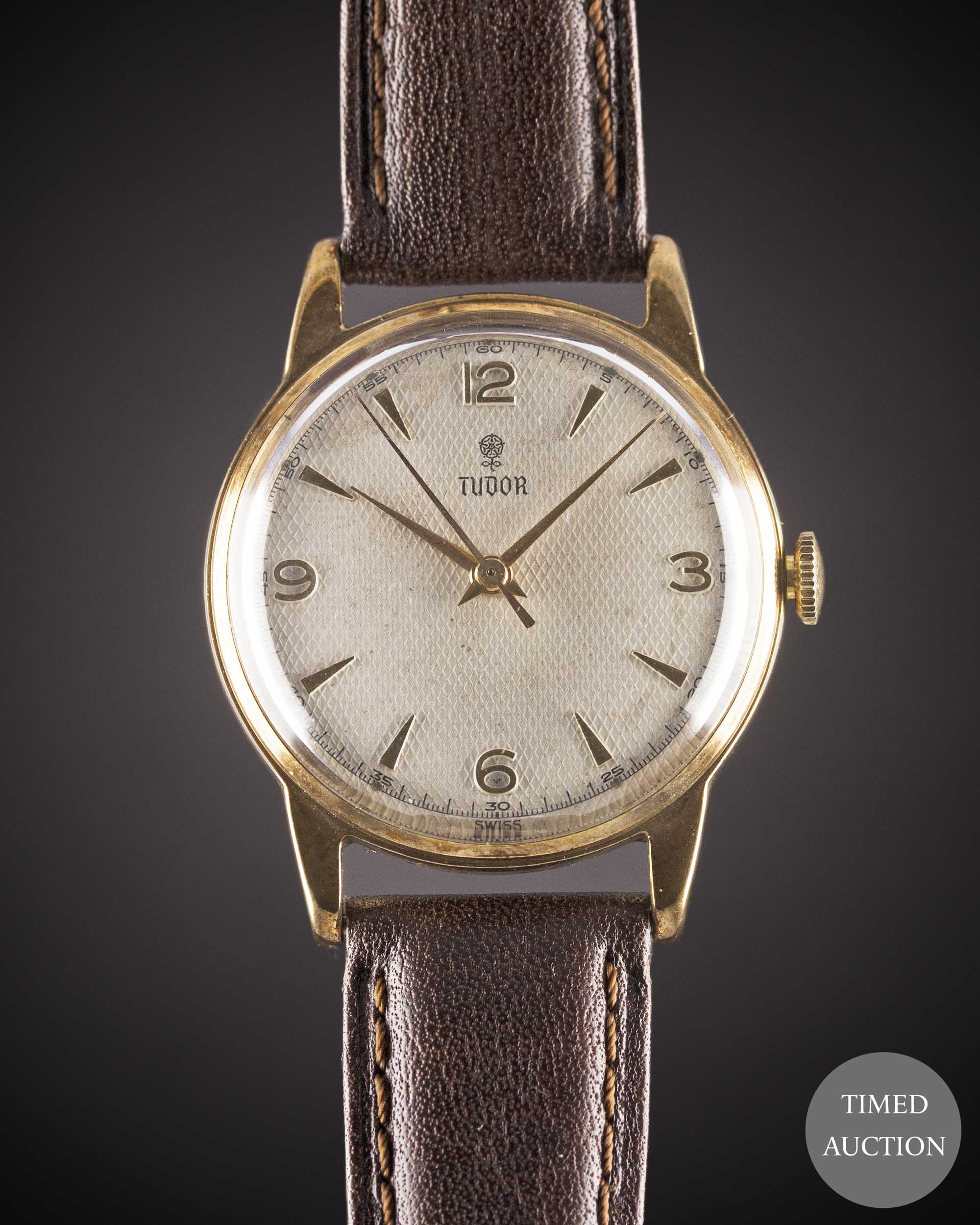 A GENTLEMAN'S 9CT SOLID GOLD ROLEX TUDOR WRIST WATCH CIRCA 1950s, REF. 12856 WITH SILVER "HONEYCOMB"