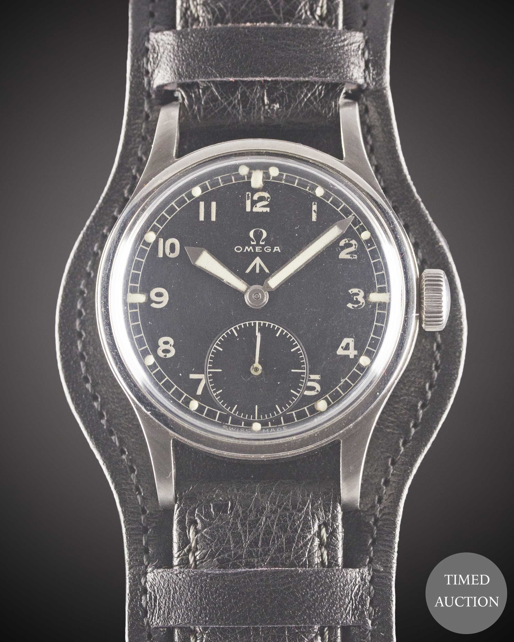 A GENTLEMAN'S STAINLESS STEEL BRITISH MILITARY OMEGA W.W.W. WRIST WATCH CIRCA 1945, PART OF THE "