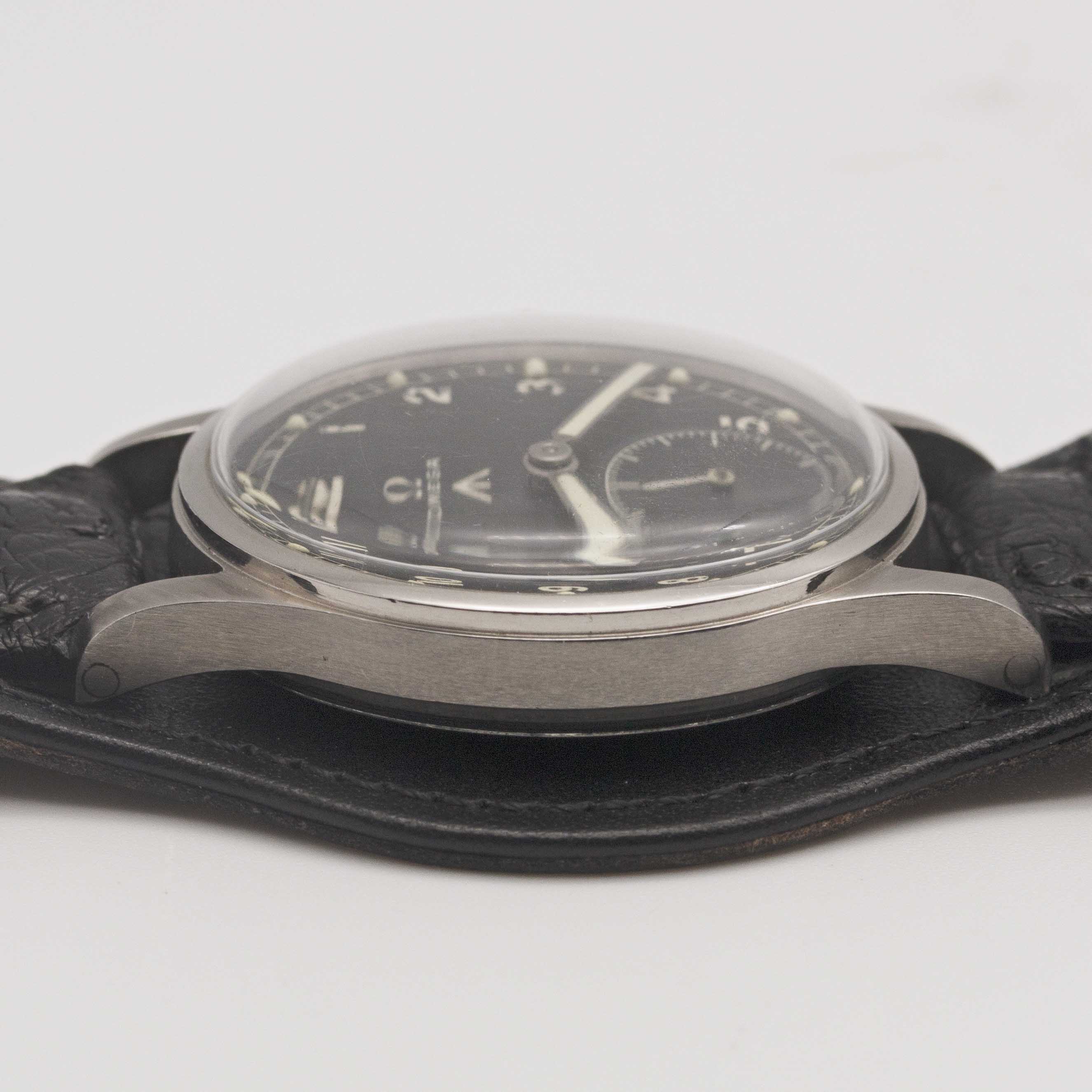 A GENTLEMAN'S STAINLESS STEEL BRITISH MILITARY OMEGA W.W.W. WRIST WATCH CIRCA 1945, PART OF THE " - Image 9 of 9