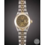 A LADIES STEEL & GOLD ROLEX OYSTER PERPETUAL DATEJUST BRACELET WATCH CIRCA 2000, REF. 69173 WITH