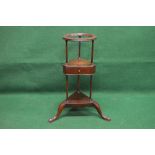 Circular mahogany wash stand having moulded circular top supported on three turned columns leading