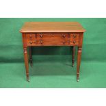 Victorian mahogany writing table the top having moulded edge over central drawer with turned knob