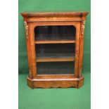 19th century walnut and inlaid pier cabinet having cut corners with brass ormolu mounts in the form