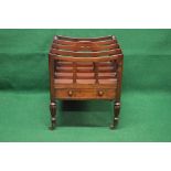 19th century mahogany four section Canterbury having pierced carrying handle and single drawer with