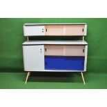 1960's Arvin kitchen dresser/sideboard having raised back with three sliding cupboard doors opening