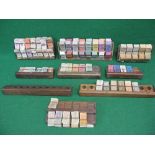 Nine wooden bus ticket racks of various designs with tickets for: Burwell & District Motor Services,