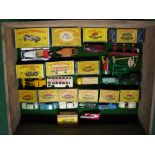 Thirteen boxed early Matchbox vehicles and petrol pumps together with three Qualitoy lorries and a