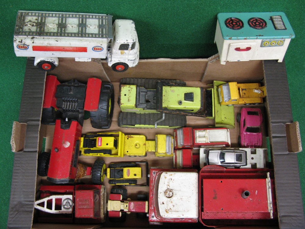 Box of playworn Tonka, a tinplate stove and a Triang Esso fuel tanker - 10.