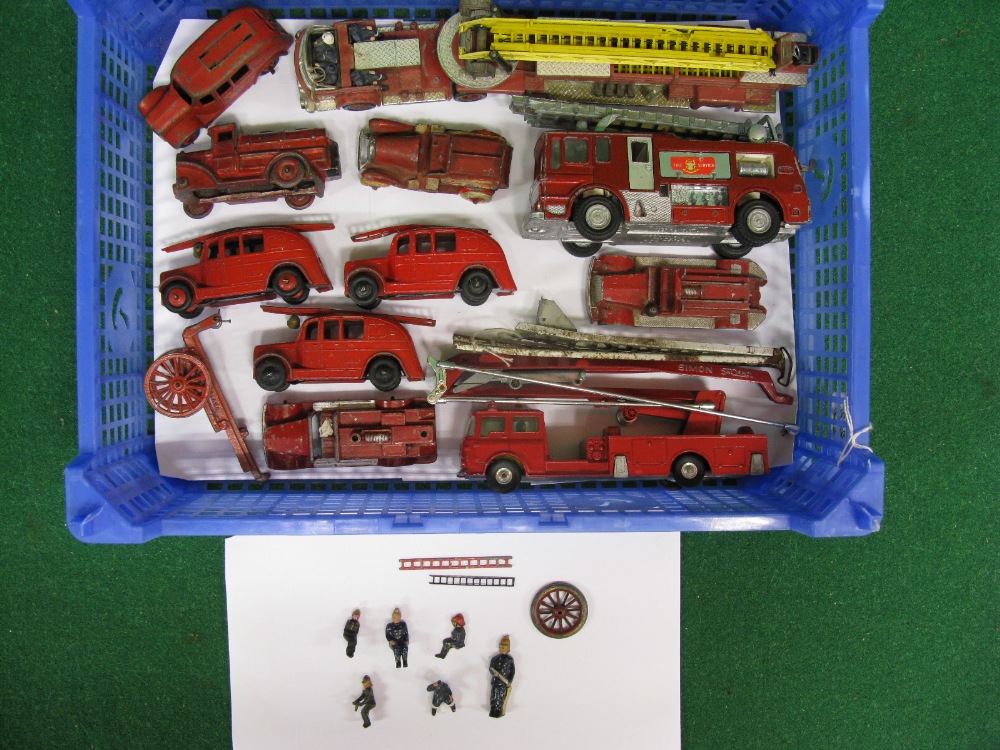 Mixed lot of diecast playworn fire engines together with firemen, ladders etc made by Corgi, Dinky,