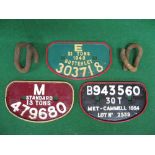 Three painted up cast iron wagon plates and two rail keys