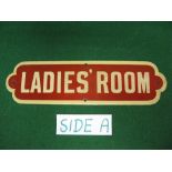 Enamel sign Ladies Room, cream letters and border on a brown ground - 20" x 5.