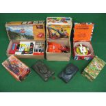 Five boxed battery and clockwork tinplate and plastic toys to comprise: Triang and NFIC tanks,