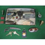 Tray of small items to include: tyre pressure gauges, AA keys, Mobil Dealer stamp, feeler gauges,