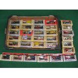 Thirty one 1980's Lledo Days Gone horse drawn models to include: fire engines, buses,