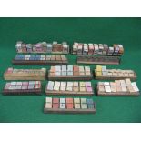 Eleven wooden bus ticket racks of various designs with tickets for: City of Exeter,