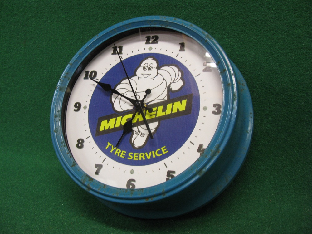 Michelin Tyre Service battery electric clock with 4" deep metal casing, 12" dia at wall.