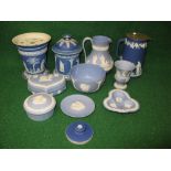 Group of blue and white Wedgwood Jasper ware to comprise: tobacco jar, vase, two jugs, small vase,