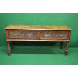 18th/19th century oak dresser base the top having moulded edge over two carved drawers with brass