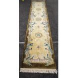 20th century Chinese style carpet runner having dragon pattern with end tassels - 134" x 27.