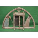 Wooden arched window frame having dowed joints incorporating a painted metal lantern frame with