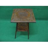 Square walnut occasional table the top having carved decoration of flowers and leaves supported on