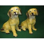 Pair of 20th century porcelain glazed figures of seated dogs - 14.