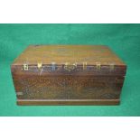 Brass bound and inlaid hardwood travelling chest the top lifting to reveal fitted interior and