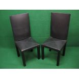 Pair of B&B Italia Arcadia black leather high back dining chairs by Paolo Piva with impressed and