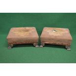 Pair of rosewood framed foot stools having upholstered tops and standing on brass scrolled feet -