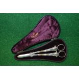 Cased pair of Mappin & Webb silver grape scissors, marked for Sheffield (weight 3.