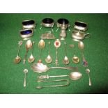 Collection of silver items to comprise: Brandy decanter label, various silver spoons, pepper pot,
