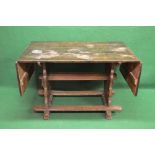 Oak refectory style drop flap table having five plank top over stretchered flat supports,