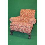 Mahogany framed armchair having red upholstery and splayed arms over a removable seat cushion,